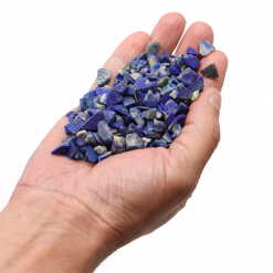 lapis lazuli chips held in an open hand