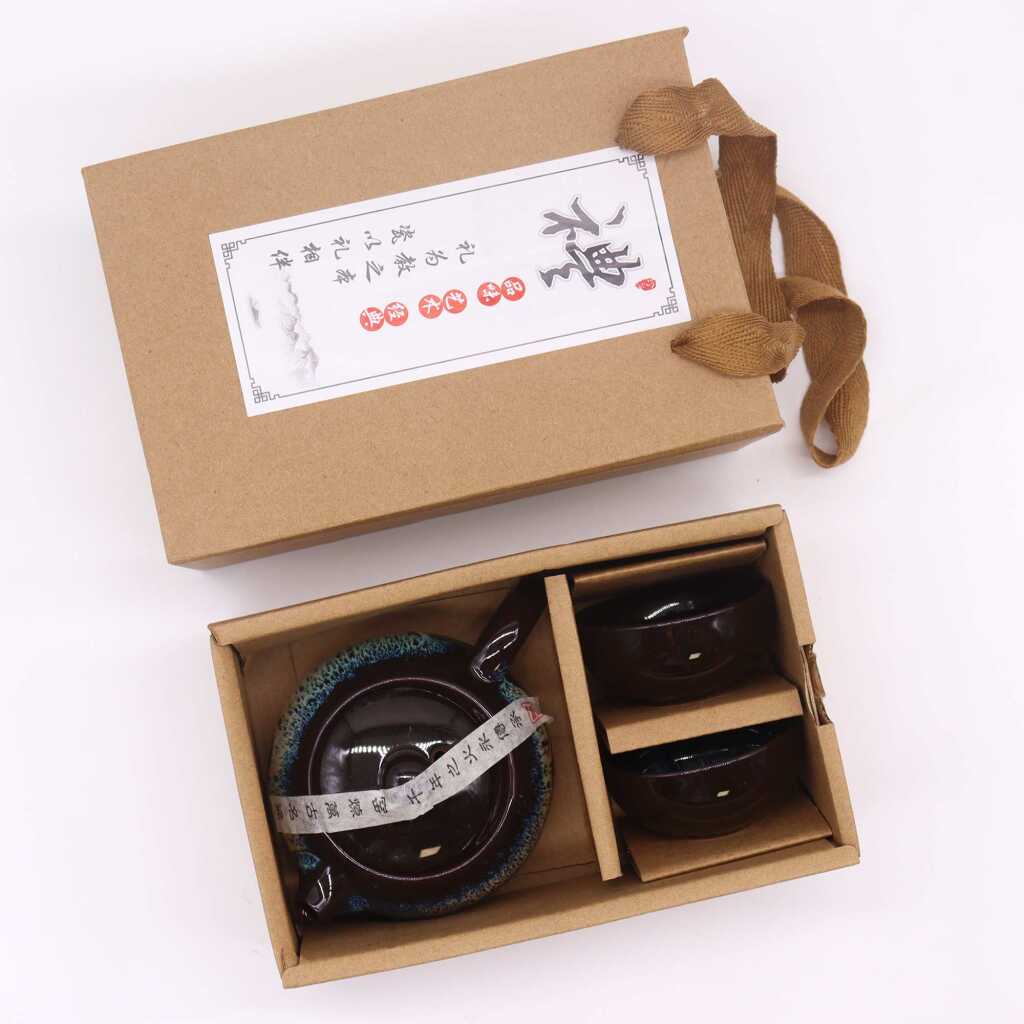 a herbal black glaze themed teapot set with two matching cups n cardboard box