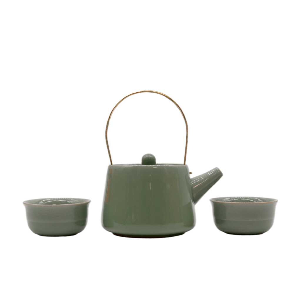 a herbal jade themed teapot set with two matching cups