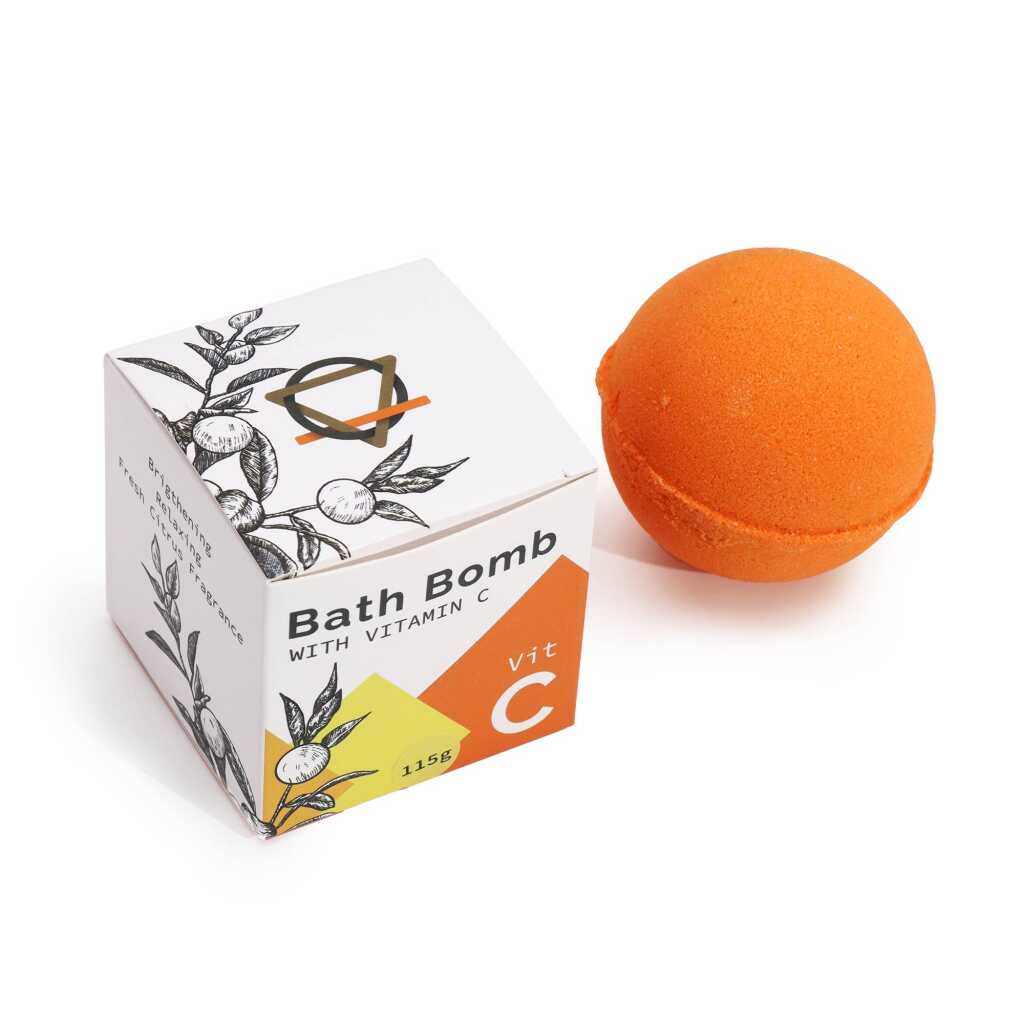 vitamin C infused orange bath bomb alongside its box.
