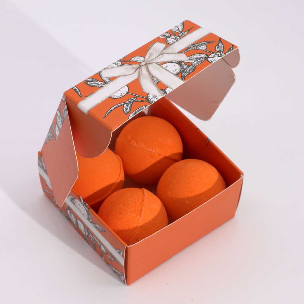 set of 4 vitamin C infused orange bath bomb in their box.