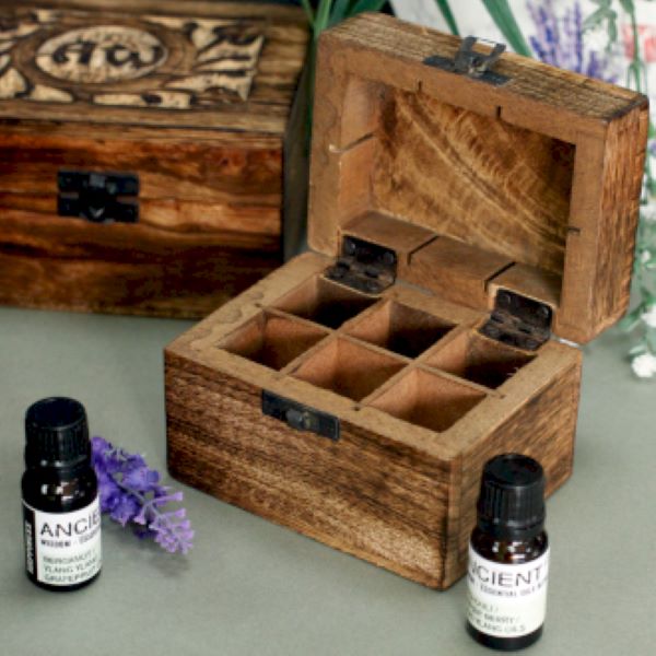 an aromatherapy box made of mango wood plus two 10ml bottles