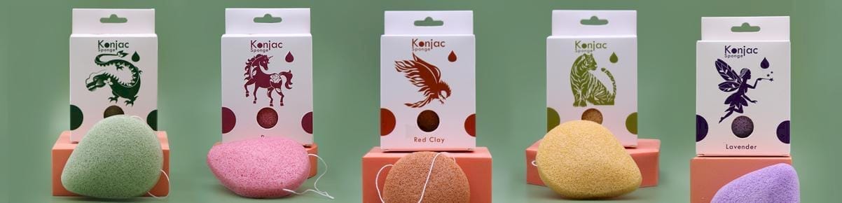 a selection of five konjac sponges, with boxes, used for facial massage