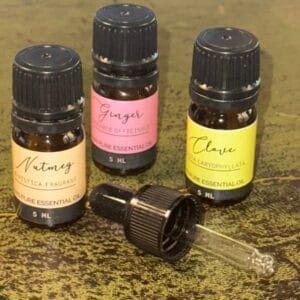 nutmeg, ginger and clove essential oils for aromatherapy