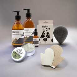 a collection of cleanse and refresh skincare products on a grey background