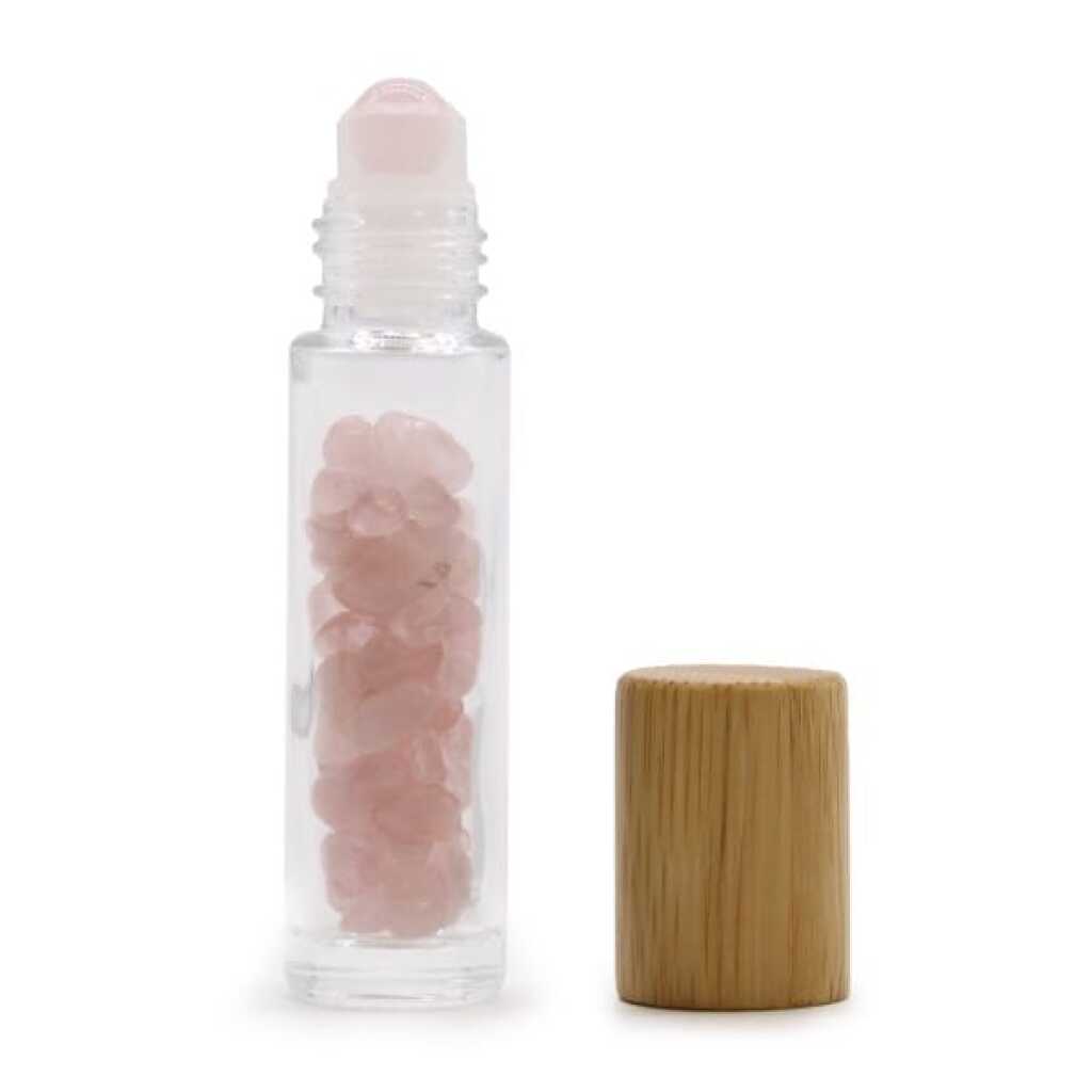 an aromatherapy gemstone roller bottle dispenser with rose quartz