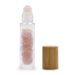 an aromatherapy gemstone roller bottle dispenser with rose quartz