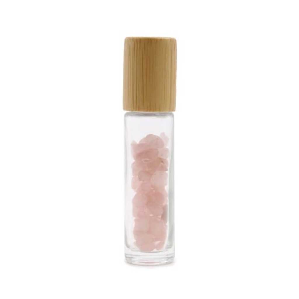 an aromatherapy gemstone roller bottle dispenser with rose quartz
