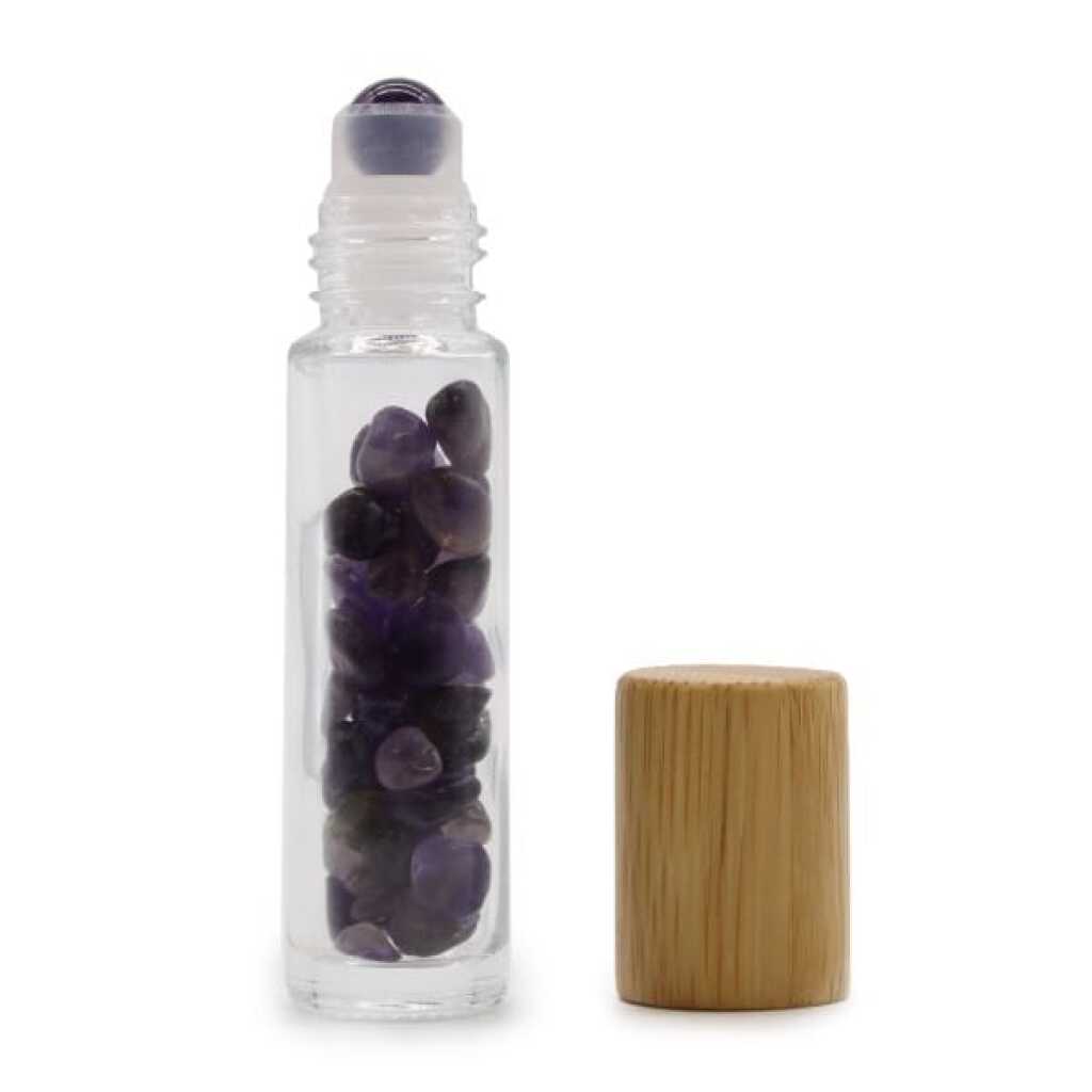 an aromatherapy gemstone roller bottle dispenser with amethyst