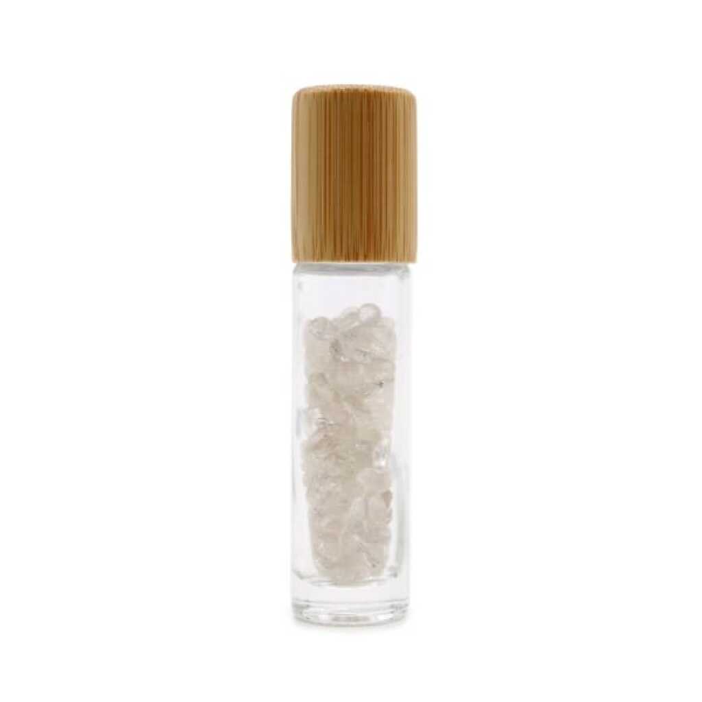 an aromatherapy gemstone roller bottle dispenser with rock quartz