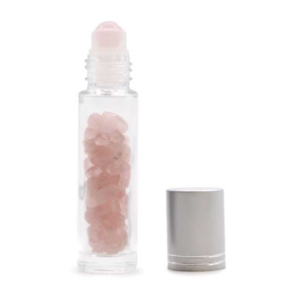 an aromatherapy gemstone roller bottle dispenser with rose quartz and silver cap
