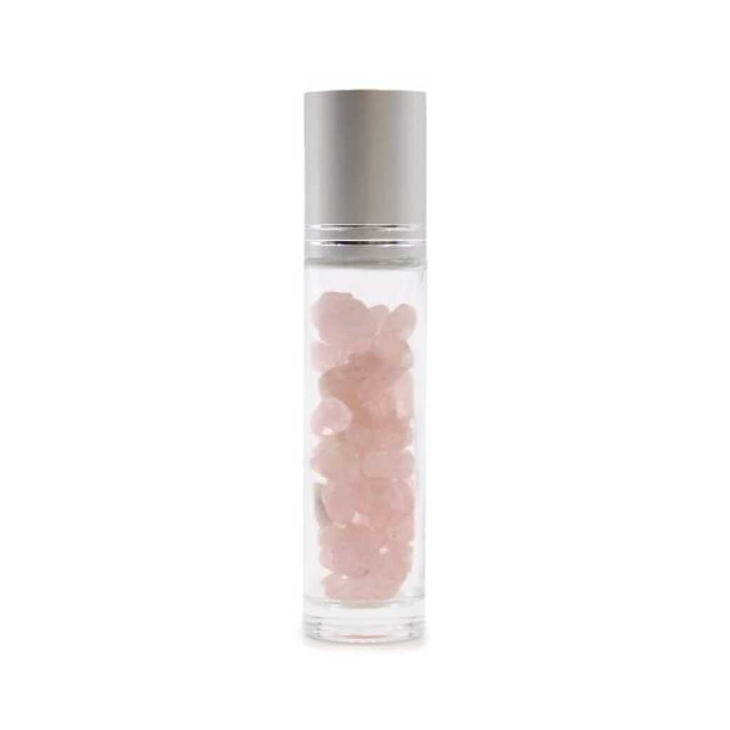 an aromatherapy gemstone roller bottle dispenser with rose quartz and silver cap