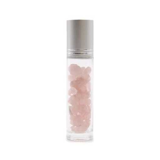 an aromatherapy gemstone roller bottle dispenser with rose quartz and silver cap