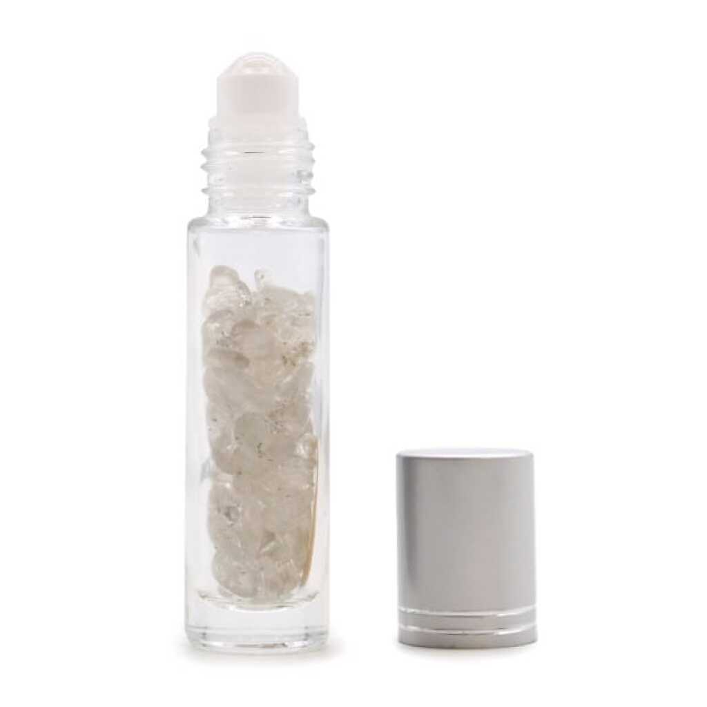 an aromatherapy gemstone roller bottle dispenser with rock quartz and silver cap