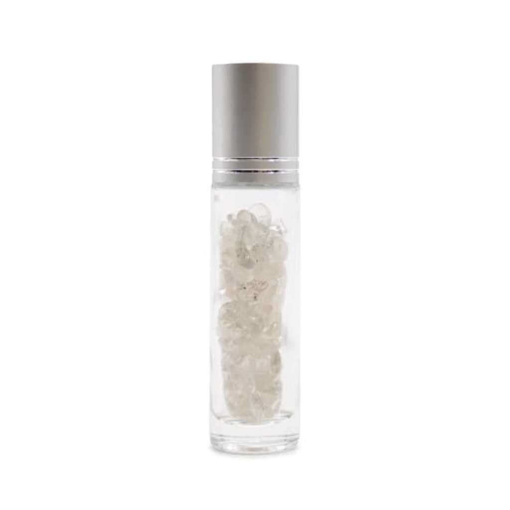 an aromatherapy gemstone roller bottle dispenser with rock quartz and silver cap
