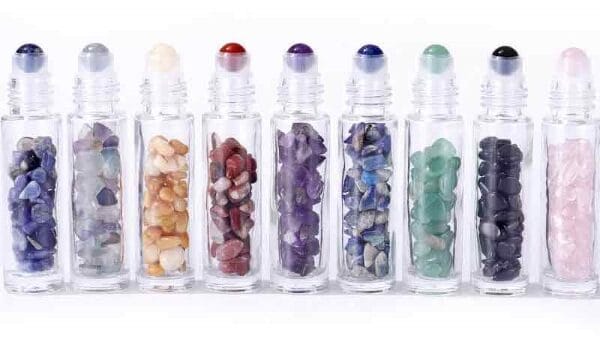 a multicoloured range of gemstone roller bottle dispensers for essential oils