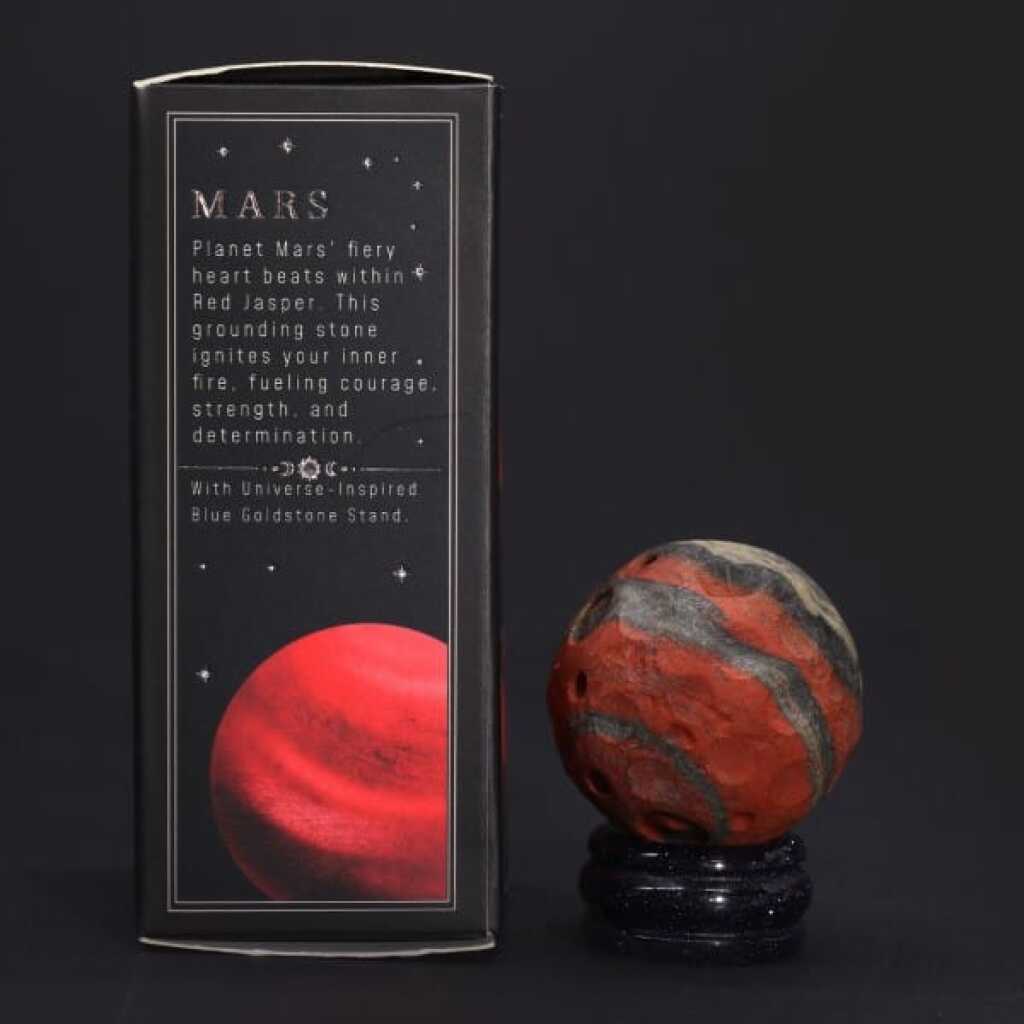 a red jasper gemstone planet representing mars with packaging