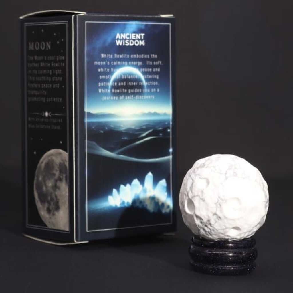 a white howlite gemstone planet representing the moon with packaging