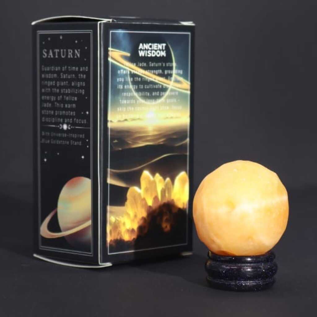 a yellow jade gemstone planet representing saturn with packaging