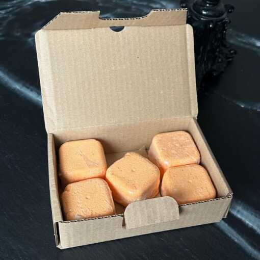 five shower steamers in sustainable cardboard packaging