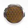An aromatherapy diffuser for the car, in the shape of the flower of life