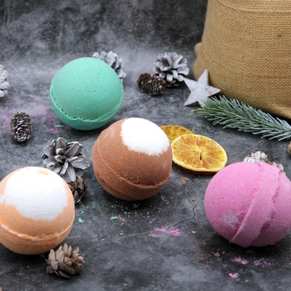 a selection of four festive bathtime bath bombs