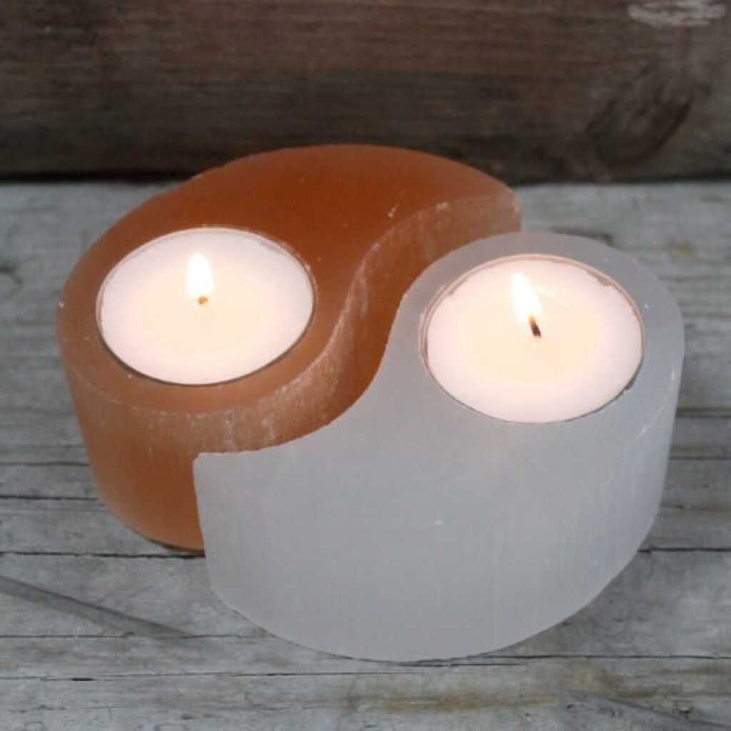 a selenite ying yang design candle holder for tealights