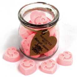 a jar of soy wax melts with four in front - midnight jasmine