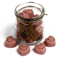 a jar of soy wax melts with four in front - coffee trader