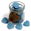 a jar of soy wax melts with four in front - nagchampa
