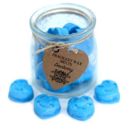 a jar of soy wax melts with four in front - dewberry