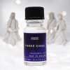 a 10ml clear bottle of Three Kings fragrance oil in a christmas setting