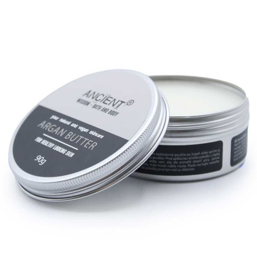 a round tin of argan butter - open