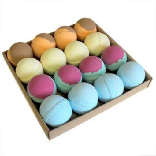 a selection of 16 christmas bath bombs in a cardboard tray
