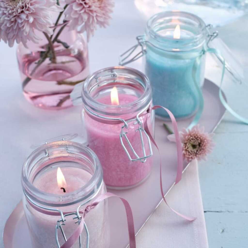 a selection of pure olive wax candles in jars