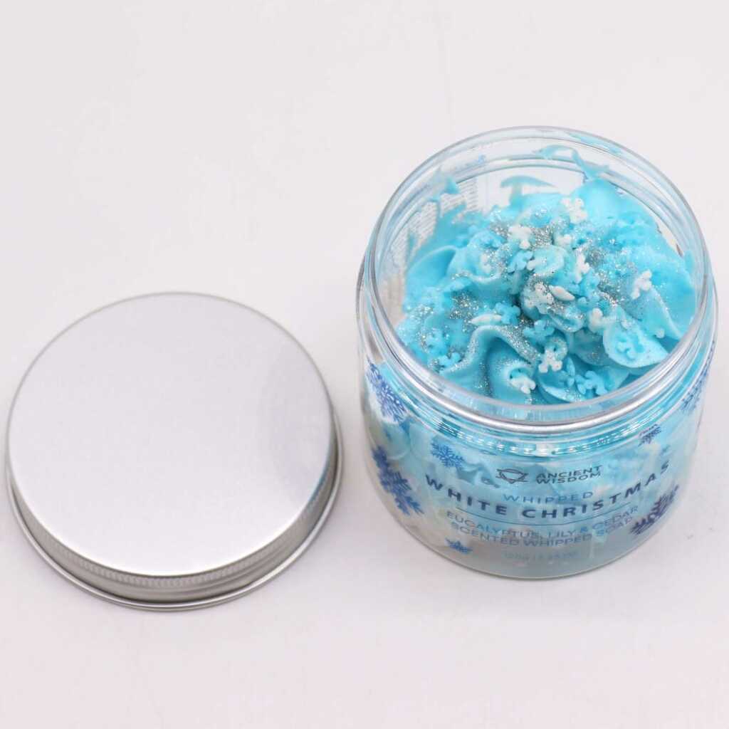 an open jar of White Christmas whipped soap, with lid