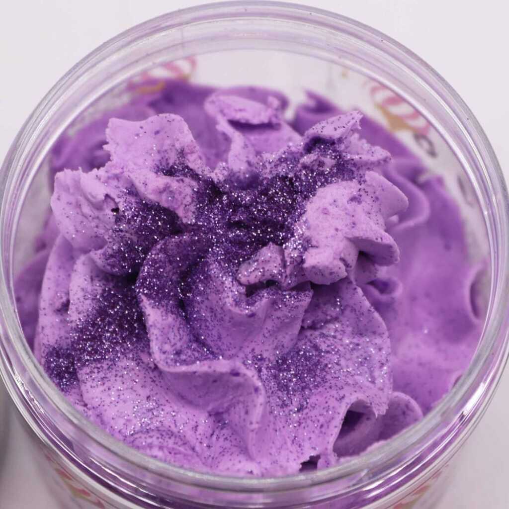 an open jar of Frosted Sugar plum whipped soap