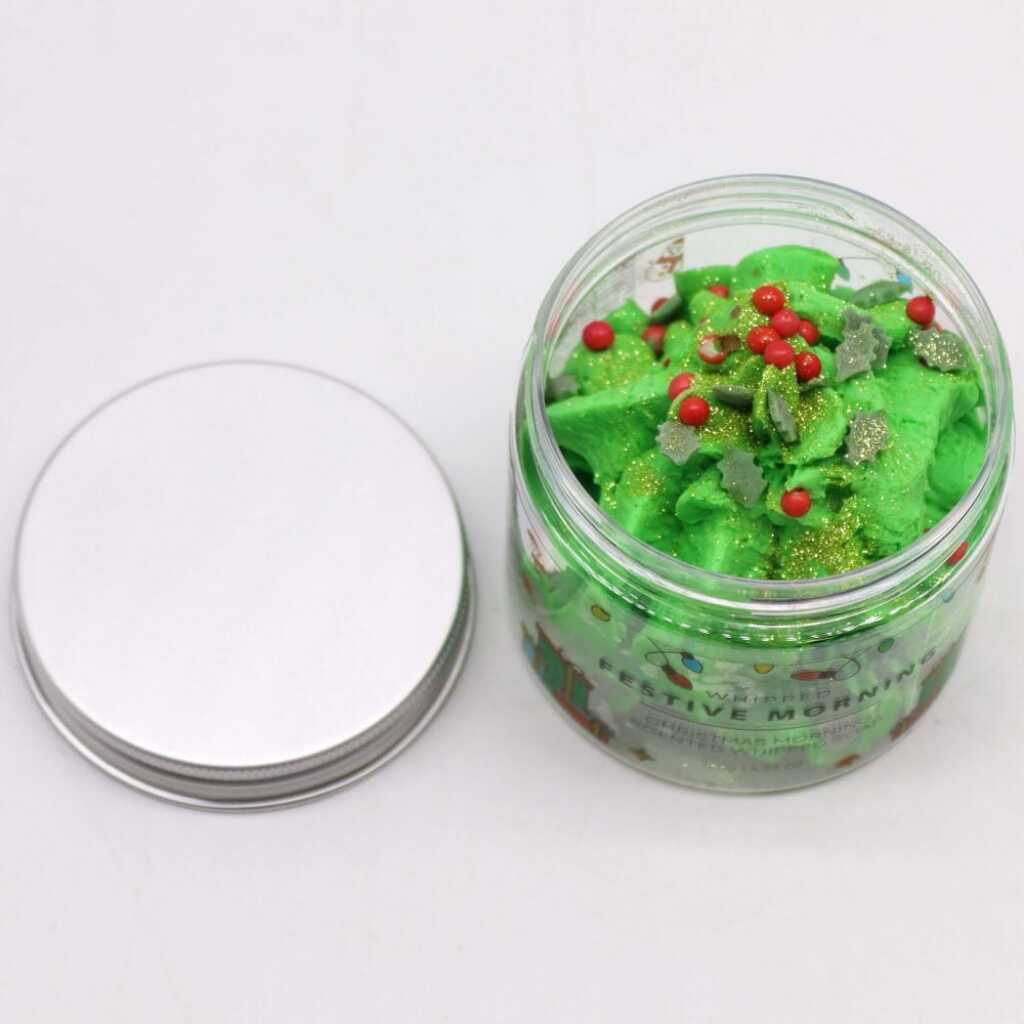 an open jar of Festive Morning whipped soap, with lid