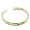 an inspiration bracelet made of brass