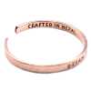 an inspiration bracelet made of copper