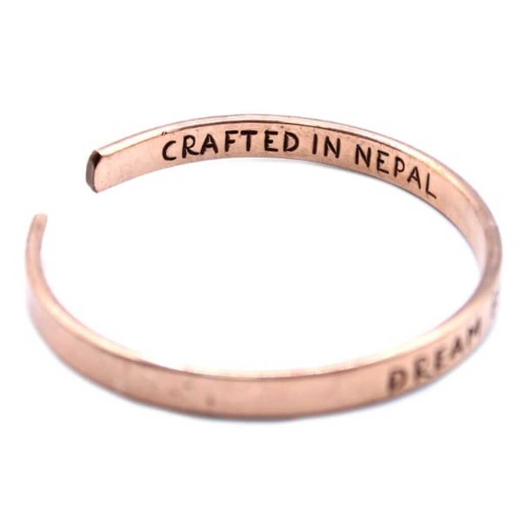 an inspiration bracelet made of copper