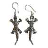 a pair of silver animal lizard earrings