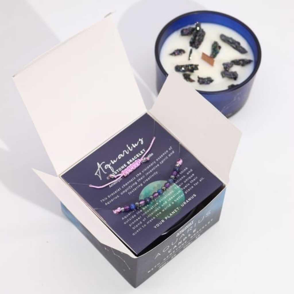 a zodiac candle with crystals and a gemstone bracelet - aquarius