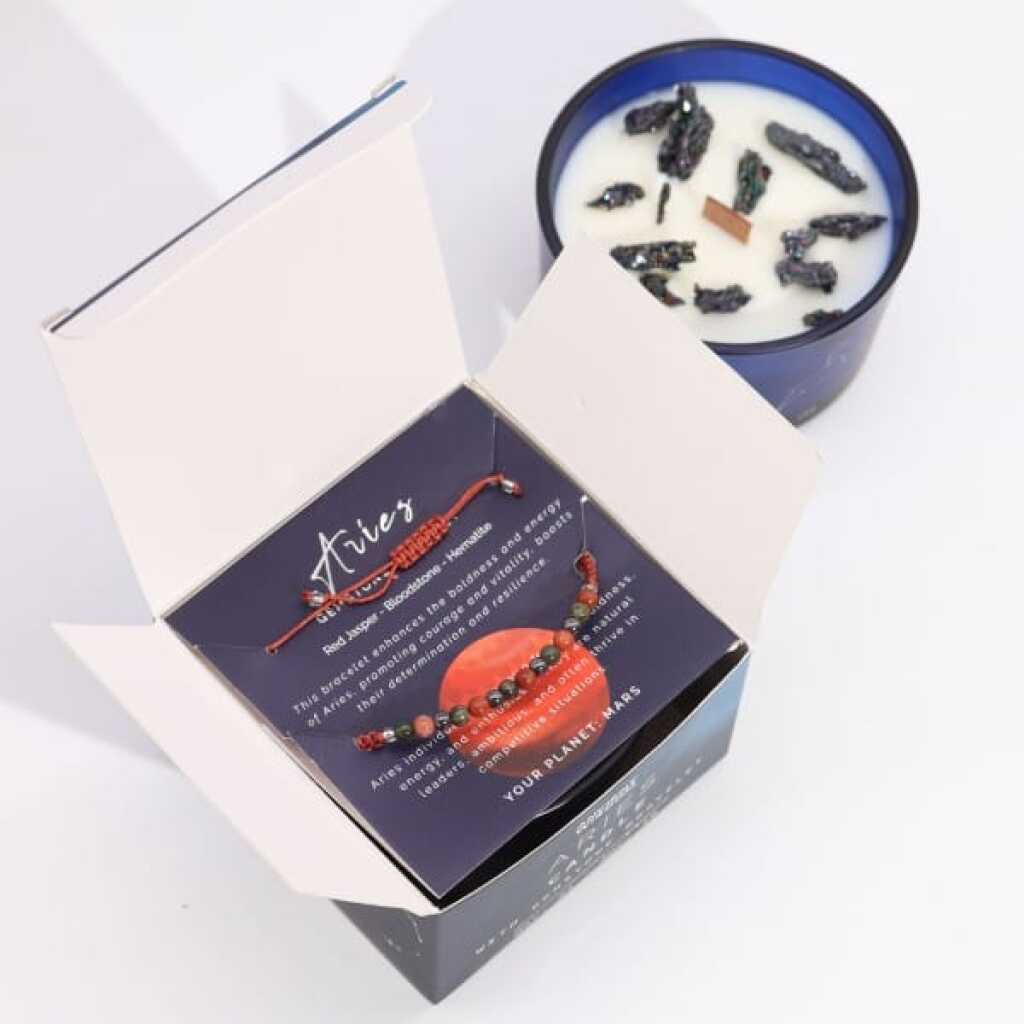 a zodiac candle with crystals and a gemstone bracelet - pisces