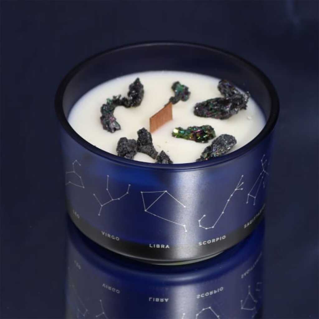a zodiac candle with crystals - gemini