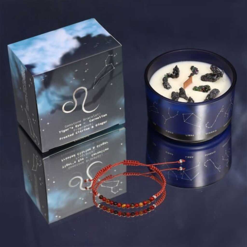 a zodiac candle with crystals and a gemstone bracelet - leo