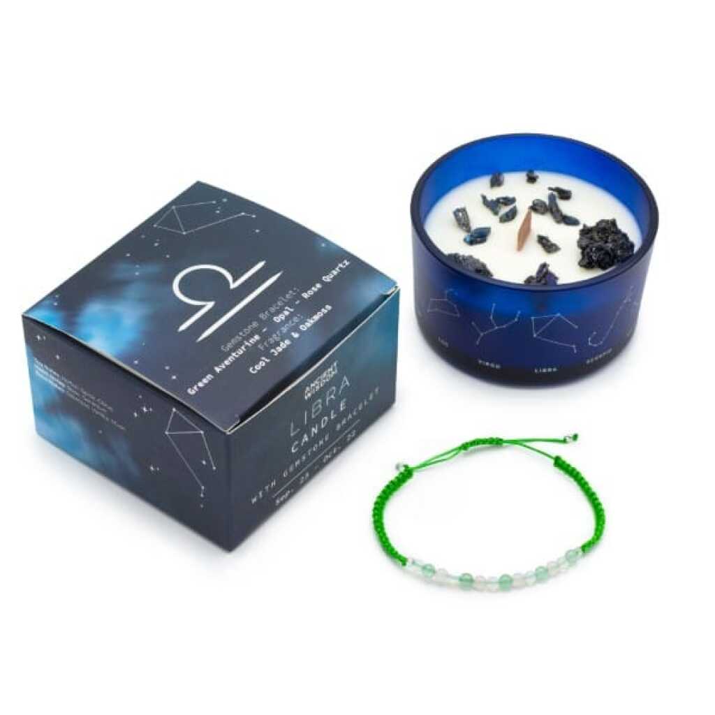 a zodiac candle with crystals and a gemstone bracelet - libra