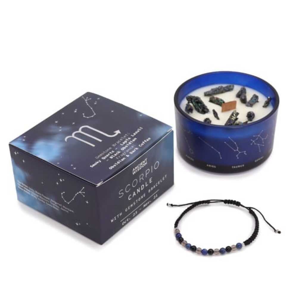 a zodiac candle with crystals and a gemstone bracelet - scorpio