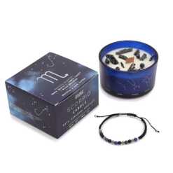 a zodiac candle with crystals and a gemstone bracelet - scorpio