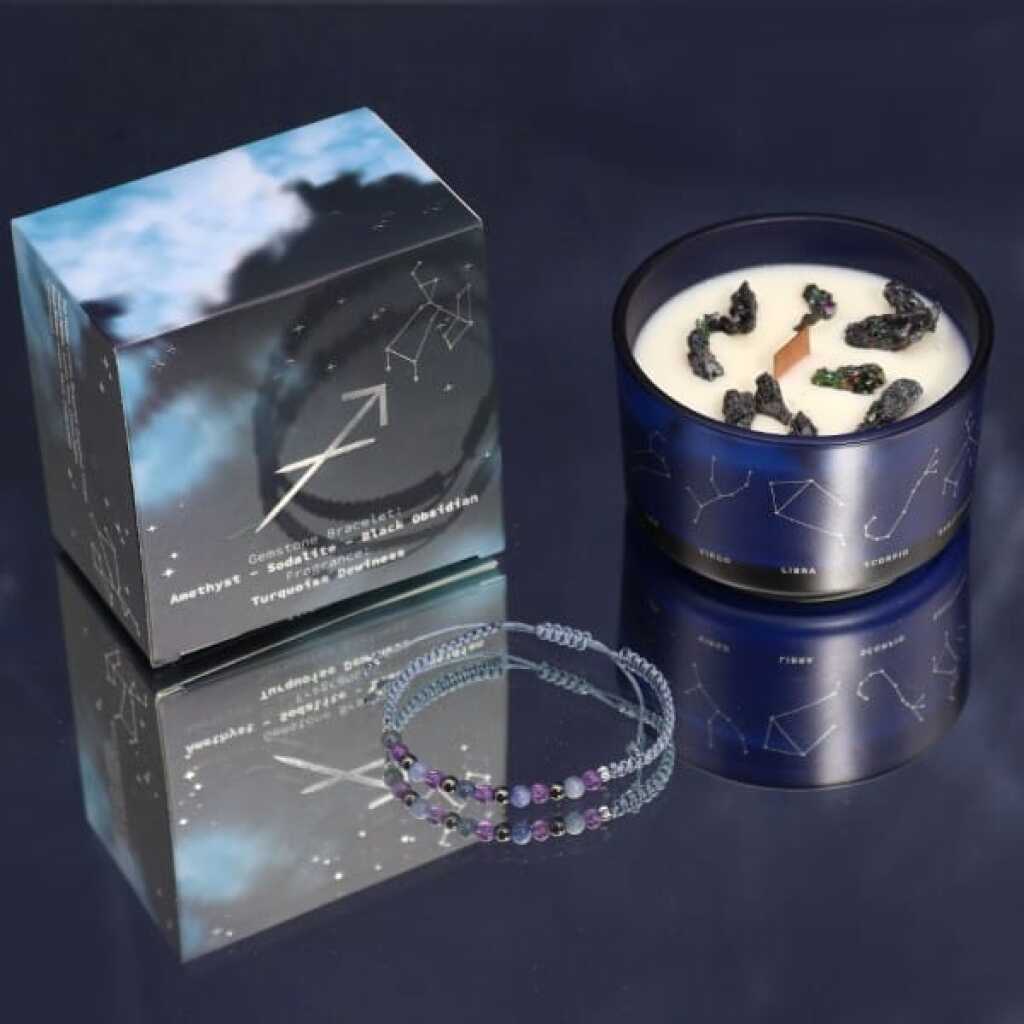 a zodiac candle with crystals and a gemstone bracelet - sagittarius